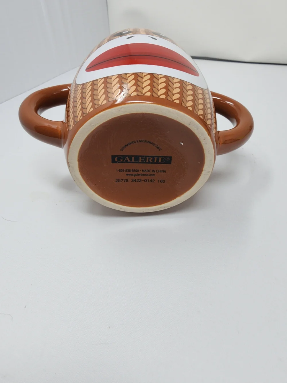 Playful Sock Monkey Double-Handle Ceramic Mug - Brown with Red Mouth